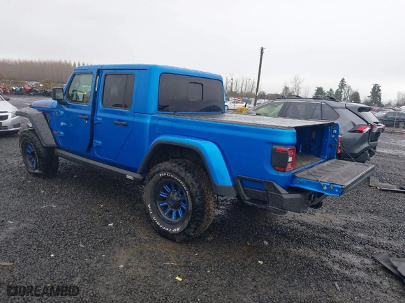 2022 Jeep Gladiator Rubicon with VIN 1C6JJTBM8NL144962, listed as a IAAI auction lot 41037201 with 12,063 mi miles. Bid and sale history available at carsss.com. Image 3.