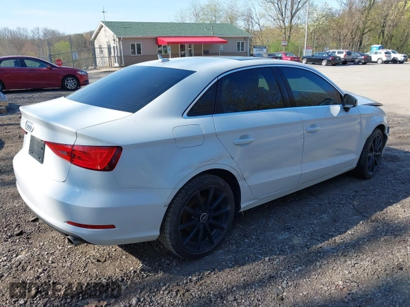2015 Audi A3 2.0T Premium Plus with VIN WAUEFGFF9F1032244, listed as a IAAI auction lot 42099626 with 105,295 mi miles. Bid and sale history available at carsss.com. Image 4.