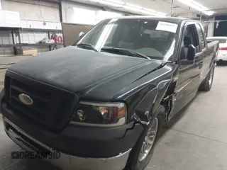 2006 Ford F-150 STX with VIN 1FTRX12W96NB42417, listed as a IAAI auction lot 41910493 with 220,559 mi miles. Bid and sale history available at carsss.com. Image 2.