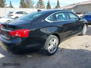 2016 Chevrolet Impala LS with VIN 2G11X5SAXG9132050, listed as a IAAI auction lot 41440712 with 156,940 mi miles. Bid and sale history available at carsss.com. Image 4.