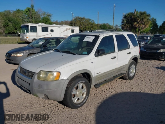 2002 Ford Escape XLT with VIN 1FMCU03112KC92704, listed as a IAAI auction lot 41807550 with 105,762 mi miles and . Bid and sale history available at DreamBid. Image 2.