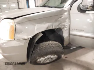 2007 GMC Yukon SLT with VIN 1GKFK13007R253674, listed as a IAAI auction lot 41683159 with 207,778 mi miles. Bid and sale history available at carsss.com. Image 6.