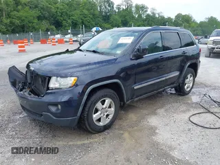 2011 Jeep Grand Cherokee Laredo with VIN 1J4RR4GG8BC543468, listed as a IAAI auction lot 42431481 with 224,639 mi miles and . Bid and sale history available at DreamBid. Image 2.