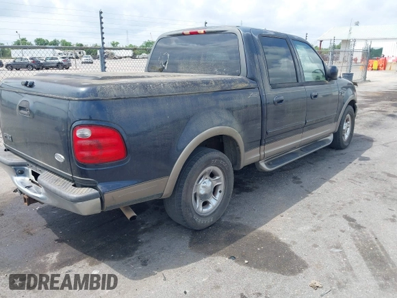 2001 Ford F-150 XLT z VIN 1FTRW07W61KA23644, wystawiony jako IAAI lot #42162523 z przebiegiem 203 636 mil mil oraz . Historia ofert i sprzedaży dostępna na DreamBid. Obrazek 4.