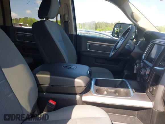 2023 Ram 1500 SLT z VIN 1C6RR7LG2PS517868, wystawiony jako IAAI lot #41983544 z przebiegiem 41 351 mil mil oraz . Historia ofert i sprzedaży dostępna na DreamBid. Obrazek 5.