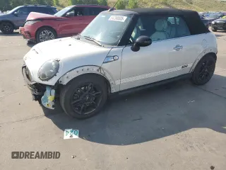 2012 MINI Convertible S z VIN WMWZP3C51CT296464, wystawiony jako Copart lot #64290005 z przebiegiem 107 580 mil mil oraz Szkoda całkowita • Salvage title. Historia ofert i sprzedaży dostępna na DreamBid. Obrazek 1.