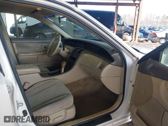 2001 Toyota Avalon XL z VIN 4T1BF28B01U144968, wystawiony jako IAAI lot #41923697 z przebiegiem 184 442 mil mil oraz . Historia ofert i sprzedaży dostępna na DreamBid. Obrazek 5.