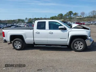 2017 GMC Sierra 1500 SLE z VIN 1GTV2MEC0HZ291794, wystawiony jako IAAI lot #42055172 z przebiegiem 235 969 mil mil oraz . Historia ofert i sprzedaży dostępna na DreamBid. Obrazek 13.