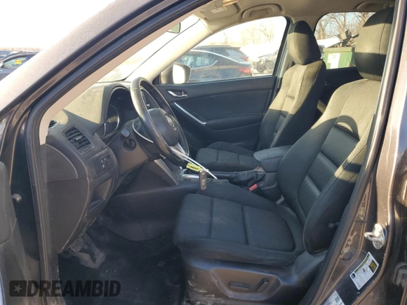 2015 Mazda CX-5 Touring with VIN JM3KE2CY0F0439125, listed as a Copart auction lot 43324945 with 210,404 mi miles and Clean Title. Bid and sale history available at DreamBid. Image 7.