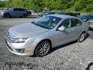 2012 Ford Fusion SEL z VIN 3FAHP0JA6CR446458, wystawiony jako Copart lot #59151065 z przebiegiem 198 278 mil mil oraz Czysty tytuł • Clean title. Historia ofert i sprzedaży dostępna na DreamBid. Obrazek 1.