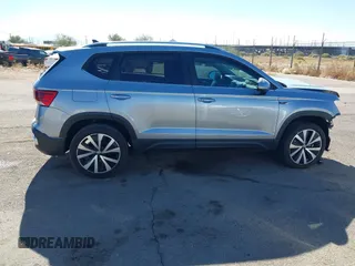 2024 Volkswagen Taos SE z VIN 3VVEX7B21RM001601, wystawiony jako IAAI lot #41406215 z przebiegiem 8 557 mil mil oraz . Historia ofert i sprzedaży dostępna na DreamBid. Obrazek 14.