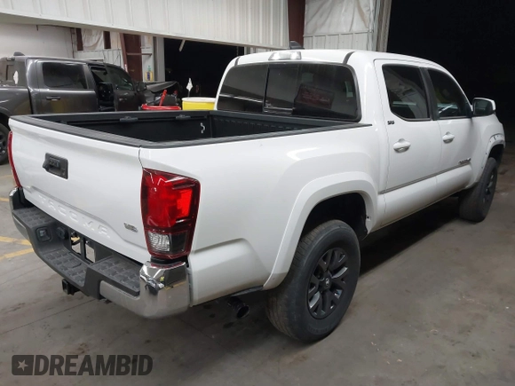 2023 Toyota Tacoma SR5 z VIN 3TYAZ5CN9PT030723, wystawiony jako IAAI lot #41607535 z przebiegiem 40 215 mil mil oraz . Historia ofert i sprzedaży dostępna na DreamBid. Obrazek 4.