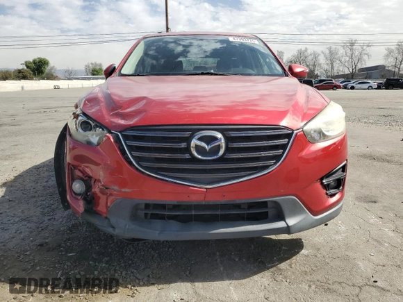 2016 Mazda CX-5 Touring with VIN JM3KE2CY9G0807478, listed as a Copart auction lot 47393775 with 105,034 mi miles and Salvage Title. Bid and sale history available at carsss.com. Image 5.