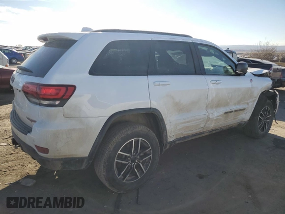 2021 Jeep Grand Cherokee Trailhawk with VIN 1C4RJFLG3MC646573, listed as a Copart auction lot 82687014 with 83,294 mi miles and Salvage Title. Bid and sale history available at carsss.com. Image 3.