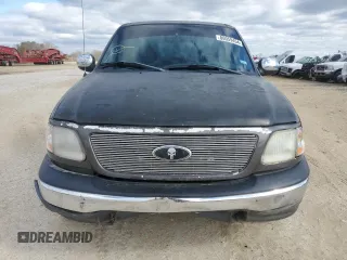 2002 Ford F-150 XL with VIN 1FTRF17W32KB68406, listed as a Copart auction lot 86059454 with 322,076 mi miles and Salvage Title. Bid and sale history available at carsss.com. Image 5.