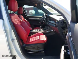 2023 Alfa Romeo Stelvio Ti with VIN ZASPAKBN4P7D63524, listed as a IAAI auction lot 41626631 with 37,731 mi miles. Bid and sale history available at carsss.com. Image 5.