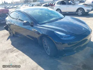 2022 Tesla Model 3 Long Range with VIN 5YJ3E1EB1NF313954, listed as a IAAI auction lot 41248187 with 31,247 mi miles. Bid and sale history available at carsss.com. Image 1.