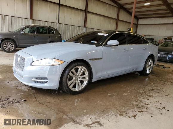 2013 Jaguar XJ with VIN SAJWJ1CD1D8V51462, listed as a Copart auction lot 50527985 with 62,995 mi miles and Salvage title. Bid and sale history available at DreamBid. Image 1.
