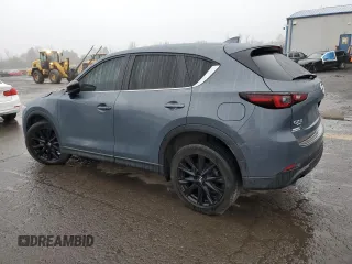 2024 Mazda CX-5 S Carbon Edition z VIN JM3KFBCM6R0367121, wystawiony jako Copart lot #51570125 z przebiegiem 49 762 mil mil oraz Szkody całkowita. Historia ofert i sprzedaży dostępna na DreamBid. Obrazek 2.