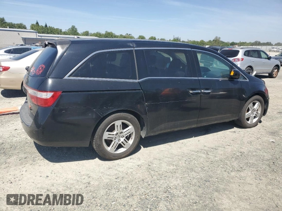 2012 Honda Odyssey Touring with VIN 5FNRL5H95CB004226, listed as a Copart auction lot 55775235 with 157,521 mi miles and Clean Title. Bid and sale history available at DreamBid. Image 3.