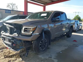 2021 Nissan Titan SV with VIN 1N6AA1ED1MN523973, listed as a IAAI auction lot 42406382 with 73,688 mi miles and . Bid and sale history available at DreamBid. Image 2.