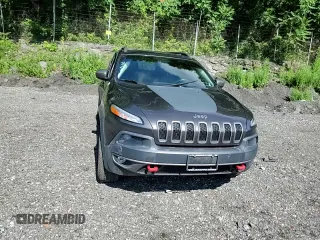2015 Jeep Cherokee Trailhawk с VIN 1C4PJMBS3FW698997, выставлен на аукционе Copart как лот 63470875 с пробегом 107 535 миль миль и Списание • Salvage title. История ставок и продаж доступна на DreamBid. Изображение 14.