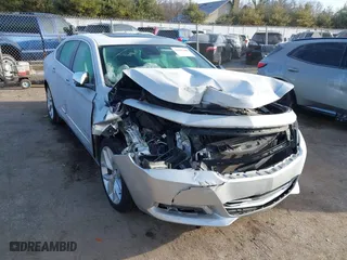 2014 Chevrolet Impala LTZ with VIN 2G1155S33E9143458, listed as a IAAI auction lot 41865302 with 75,554 mi miles. Bid and sale history available at carsss.com. Image 1.