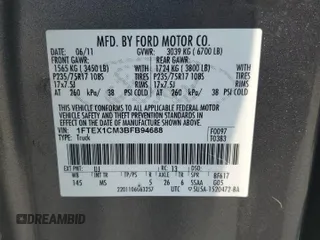 2011 Ford F-150 XL z VIN 1FTEX1CM3BFB94688, wystawiony jako Copart lot #61172765 z przebiegiem 197 227 mil mil oraz Szkoda całkowita • Salvage title. Historia ofert i sprzedaży dostępna na DreamBid. Obrazek 13.