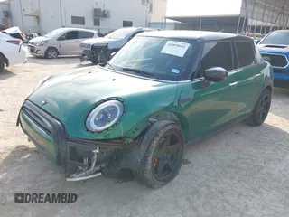 2022 MINI Hardtop 4 Door Cooper z VIN WMW33DK04N2P84250, wystawiony jako IAAI lot #42059692 z przebiegiem 34 238 mil mil oraz . Historia ofert i sprzedaży dostępna na DreamBid. Obrazek 2.