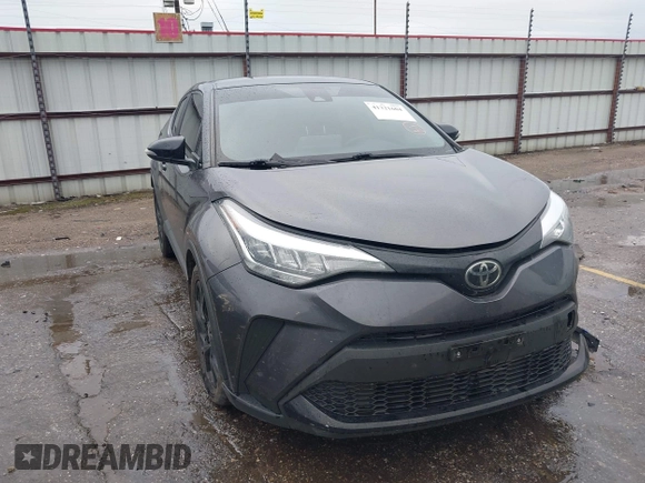 2021 Toyota C-HR LE with VIN JTNKHMBX0M1129080, listed as a IAAI auction lot 41321604 with 52,916 mi miles. Bid and sale history available at carsss.com. Image 1.