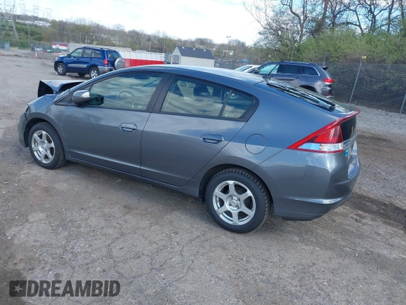 2013 Honda Insight EX z VIN JHMZE2H71DS004170, wystawiony jako IAAI lot #41971733 z przebiegiem 174 000 mil mil oraz . Historia ofert i sprzedaży dostępna na DreamBid. Obrazek 3.