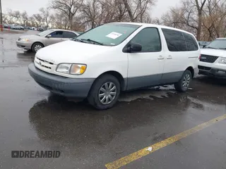 1999 Toyota Sienna CE with VIN 4T3ZF19C0XU169353, listed as a IAAI auction lot 41534196 with 189,783 mi miles. Bid and sale history available at carsss.com. Image 2.