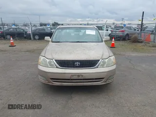 2001 Toyota Avalon XL w/Bucket Seats with VIN 4T1BF28B91U173868, listed as a IAAI auction lot 41721904 with 325,097 mi miles. Bid and sale history available at carsss.com. Image 6.