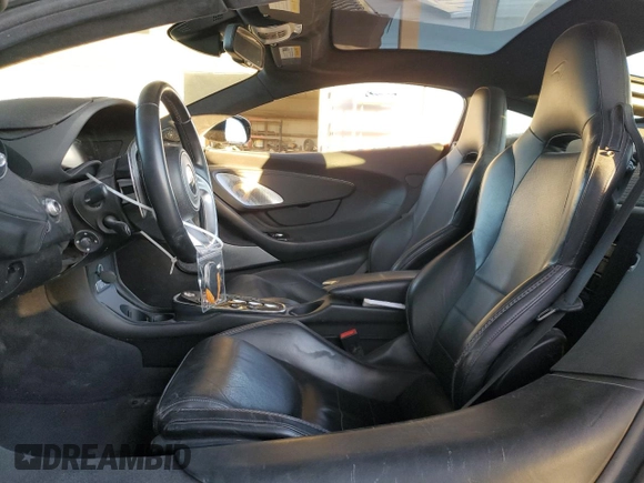 2022 McLaren GT z VIN SBM22GCA4NW001602, wystawiony jako Copart lot #83270334 z przebiegiem 33 668 mil mil oraz Tytuł czysty. Historia ofert i sprzedaży dostępna na DreamBid. Obrazek 7.