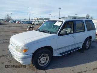 1995 Ford Explorer Eddie Bauer z VIN 1FMDU34X4SZB10719, wystawiony jako IAAI lot #41808364 z przebiegiem 140 085 mil mil oraz . Historia ofert i sprzedaży dostępna na DreamBid. Obrazek 2.
