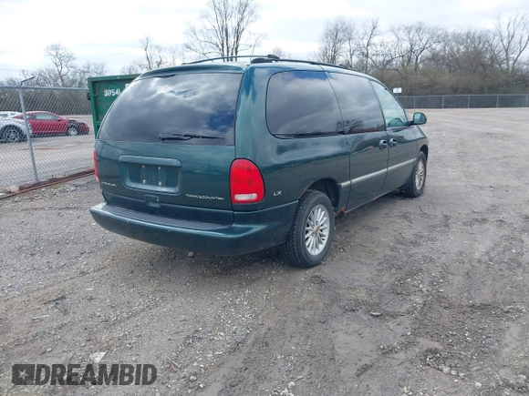 1999 Chrysler Town & Country with VIN 1C4GP54G6XB603564, listed as a IAAI auction lot 41823340 with 104,321 mi miles and . Bid and sale history available at DreamBid. Image 4.