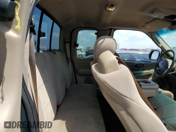 2002 Ford F-150 XL z VIN 1FTRX17W52NB81525, wystawiony jako Copart lot #57981075 z przebiegiem 236 673 mil mil oraz Szkoda całkowita • Salvage title. Historia ofert i sprzedaży dostępna na DreamBid. Obrazek 10.