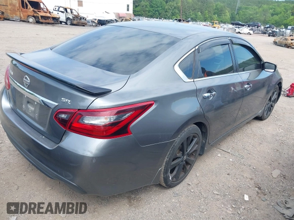 2017 Nissan Altima SV z VIN 1N4AL3AP4HC266324, wystawiony jako IAAI lot #42170025 z przebiegiem 127 595 mil mil oraz . Historia ofert i sprzedaży dostępna na DreamBid. Obrazek 4.