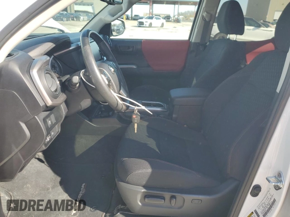 2022 Toyota Tacoma SR with VIN 3TMCZ5AN3NM506811, listed as a Copart auction lot 84630754 with 32,099 mi miles and Salvage title. Bid and sale history available at DreamBid. Image 7.