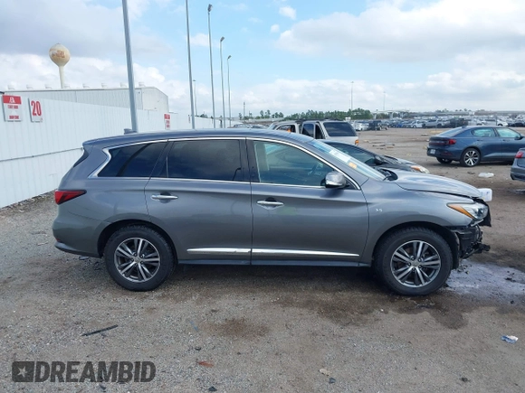 2020 Infiniti QX60 Luxe z VIN 5N1DL0MNXLC523376, wystawiony jako IAAI lot #41189601 z przebiegiem 47 655 mil mil oraz . Historia ofert i sprzedaży dostępna na DreamBid. Obrazek 14.