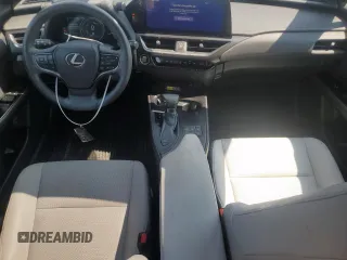 2023 Lexus UX 250h Premium с VIN JTHP9JBHXP2070096, выставлен на аукционе Copart как лот 65645035 с пробегом 9 748 миль миль и Списание • Salvage title. История ставок и продаж доступна на DreamBid. Изображение 8.