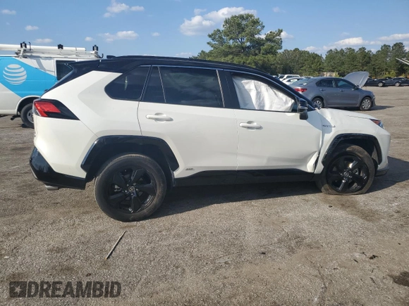 2021 Toyota RAV4 Hybrid XSE with VIN 2T3E6RFV1MW028094, listed as a Copart auction lot 52596615 with 68,497 mi miles and Salvage title. Bid and sale history available at DreamBid. Image 3.
