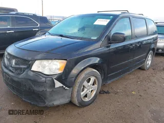 2012 Dodge Grand Caravan SXT with VIN 2C4RDGCG3CR318900, listed as a IAAI auction lot 41145958 with 201,117 mi miles and . Bid and sale history available at DreamBid. Image 2.