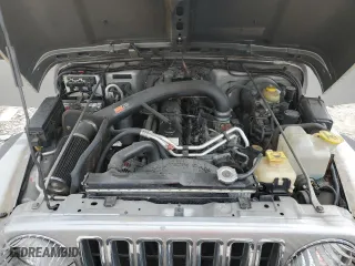 2000 Jeep Wrangler Sport with VIN 1J4FA49S4YP789348, listed as a Copart auction lot 50521365 with 0 mi miles and Salvage Title. Bid and sale history available at carsss.com. Image 12.