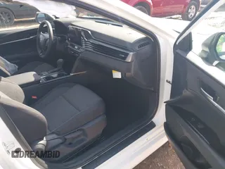 2025 Toyota Camry LE with VIN 4T1DAACK3SU529581, listed as a IAAI auction lot 41376433 with 5,283 mi miles and . Bid and sale history available at DreamBid. Image 5.