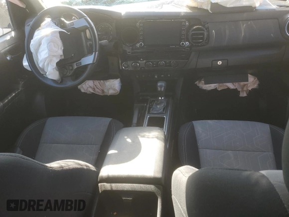 2023 Toyota Tacoma SR z VIN 3TMCZ5AN2PM536188, wystawiony jako Copart lot #58375675 z przebiegiem Nie podano mil oraz Szkoda całkowita • Salvage title. Historia ofert i sprzedaży dostępna na DreamBid. Obrazek 8.