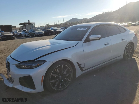 2022 BMW i4 eDrive40 with VIN WBY73AW0XNFN06571, listed as a Copart auction lot 38381984 with 24,184 mi miles. Bid and sale history available at carsss.com. Image 1.