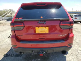 2019 Jeep Grand Cherokee Trailhawk with VIN 1C4RJFLT4KC787940, listed as a Copart auction lot 60883895 with 77,160 mi miles and Salvage title. Bid and sale history available at DreamBid. Image 6.