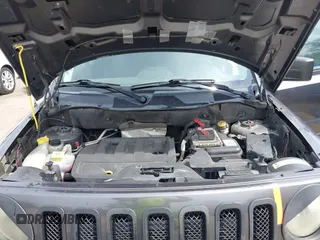 2014 Jeep Patriot Latitude with VIN 1C4NJRFB3ED847997, listed as a IAAI auction lot 42109140 with 121,299 mi miles and . Bid and sale history available at carsss.com. Image 10.