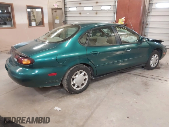 1996 Ford Taurus GL z VIN 1FALP52U5TG110582, wystawiony jako IAAI lot #40858639 z przebiegiem 57 965 mil mil oraz . Historia ofert i sprzedaży dostępna na DreamBid. Obrazek 4.